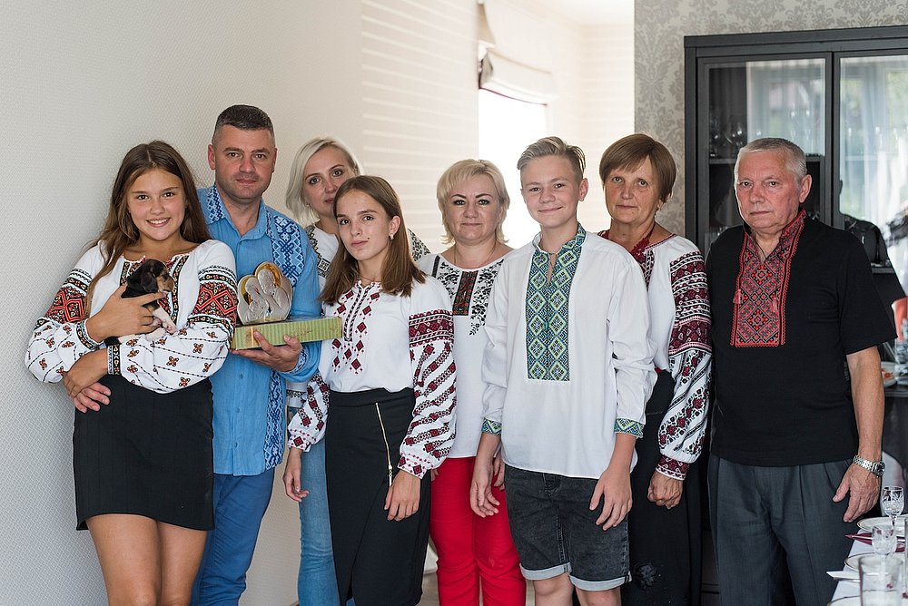 Happy,Family,In,Ukrainian,National,Clothes,On,Home,Background.,No